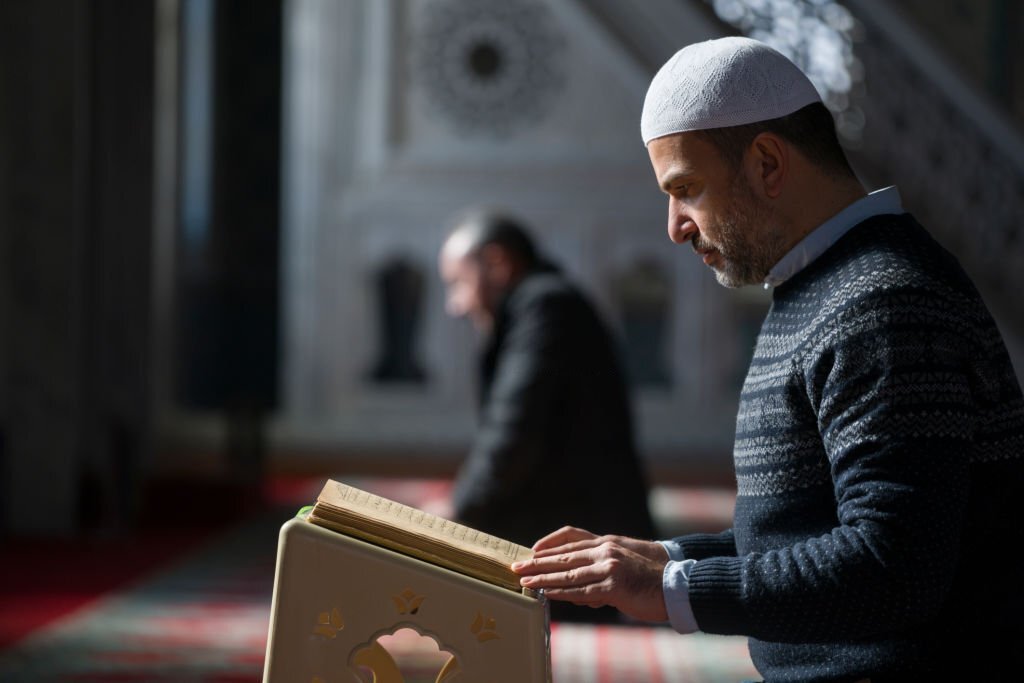 Muslims prayer namaz in mosque sunlight from window