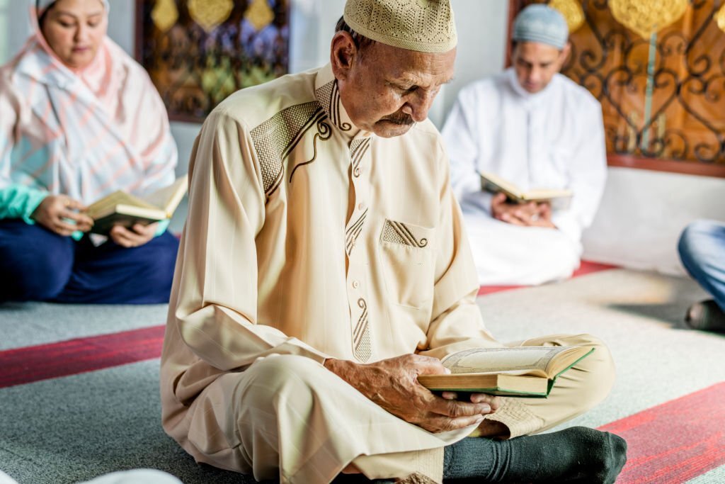 Muslims reading from the quran