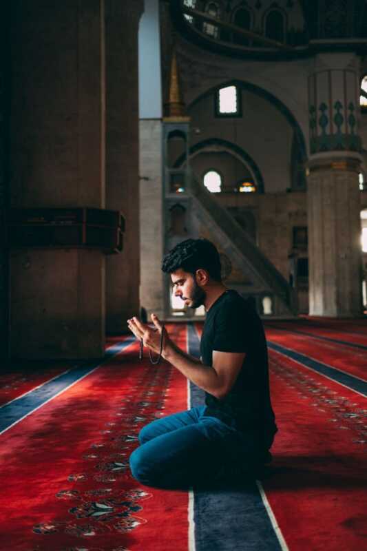 Muslim Man Praying in Mosque